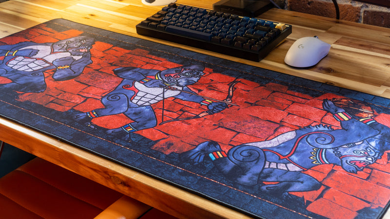 "ANCIENT OOKS" — Rust Deskmat
