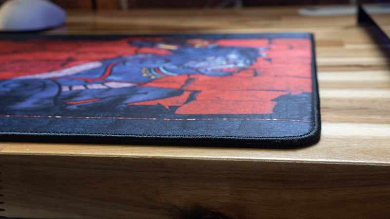 "ANCIENT OOKS" — Rust Deskmat