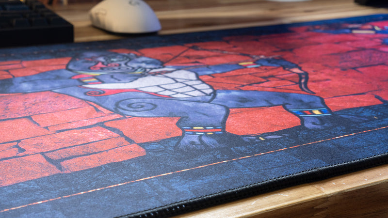 "ANCIENT OOKS" — Rust Deskmat