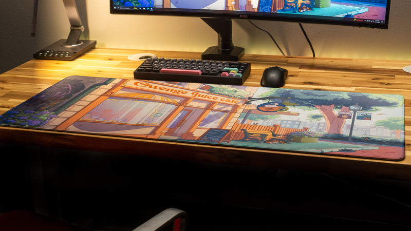 "The OwengeJuice Cafe" — OwengeJuice Deskmat