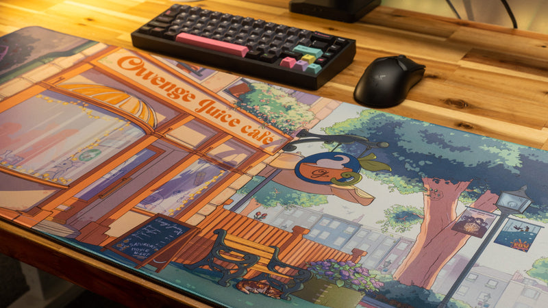 "The OwengeJuice Cafe" — OwengeJuice Deskmat