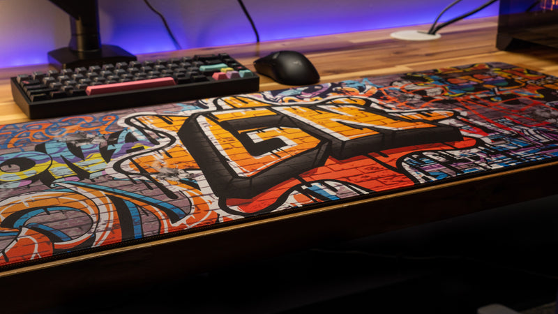 "Graffiti" — Glo Navy Deskmat