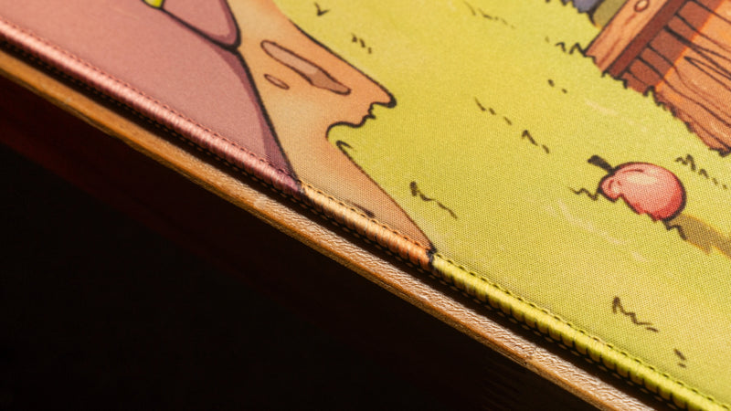 "Touching Grass" — EricVanWilderman Deskmat