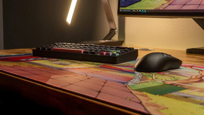 "Touching Grass" — EricVanWilderman Deskmat