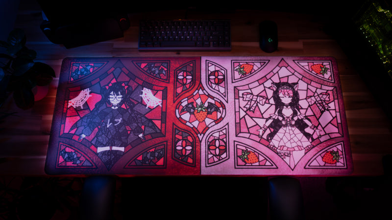 Stained Glass Rev x Strawb limited-edition deskmat on a gaming desk