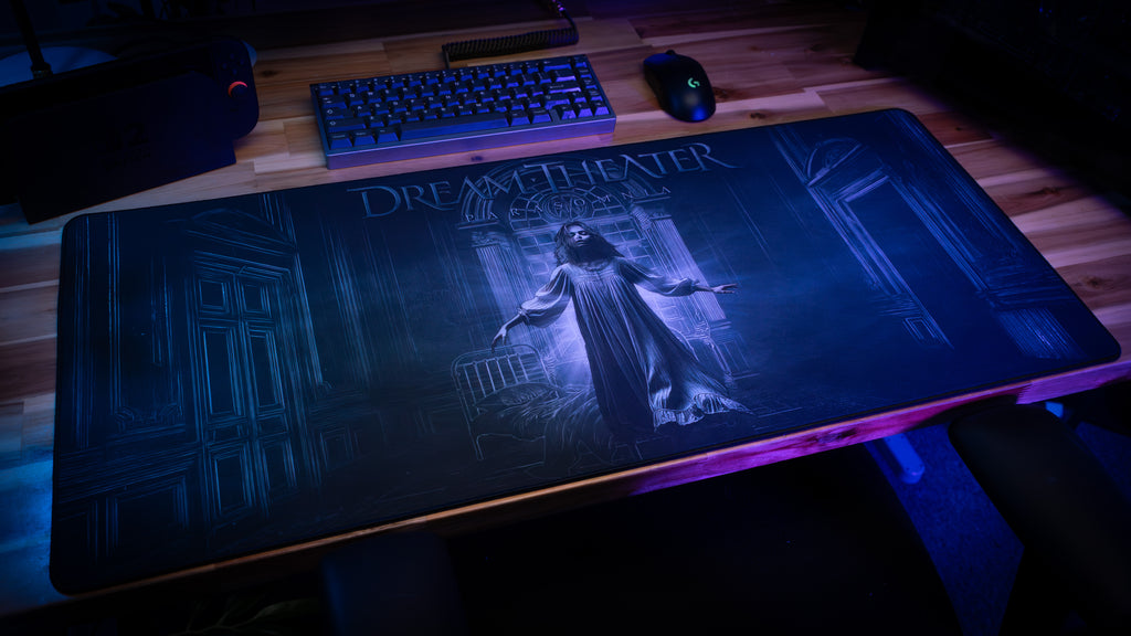 Gaming mouse pad with a dark-themed design on a desk