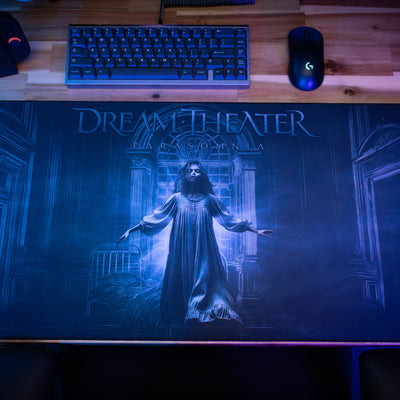 Dream Theater mouse pad on a desk with keyboard and mouse