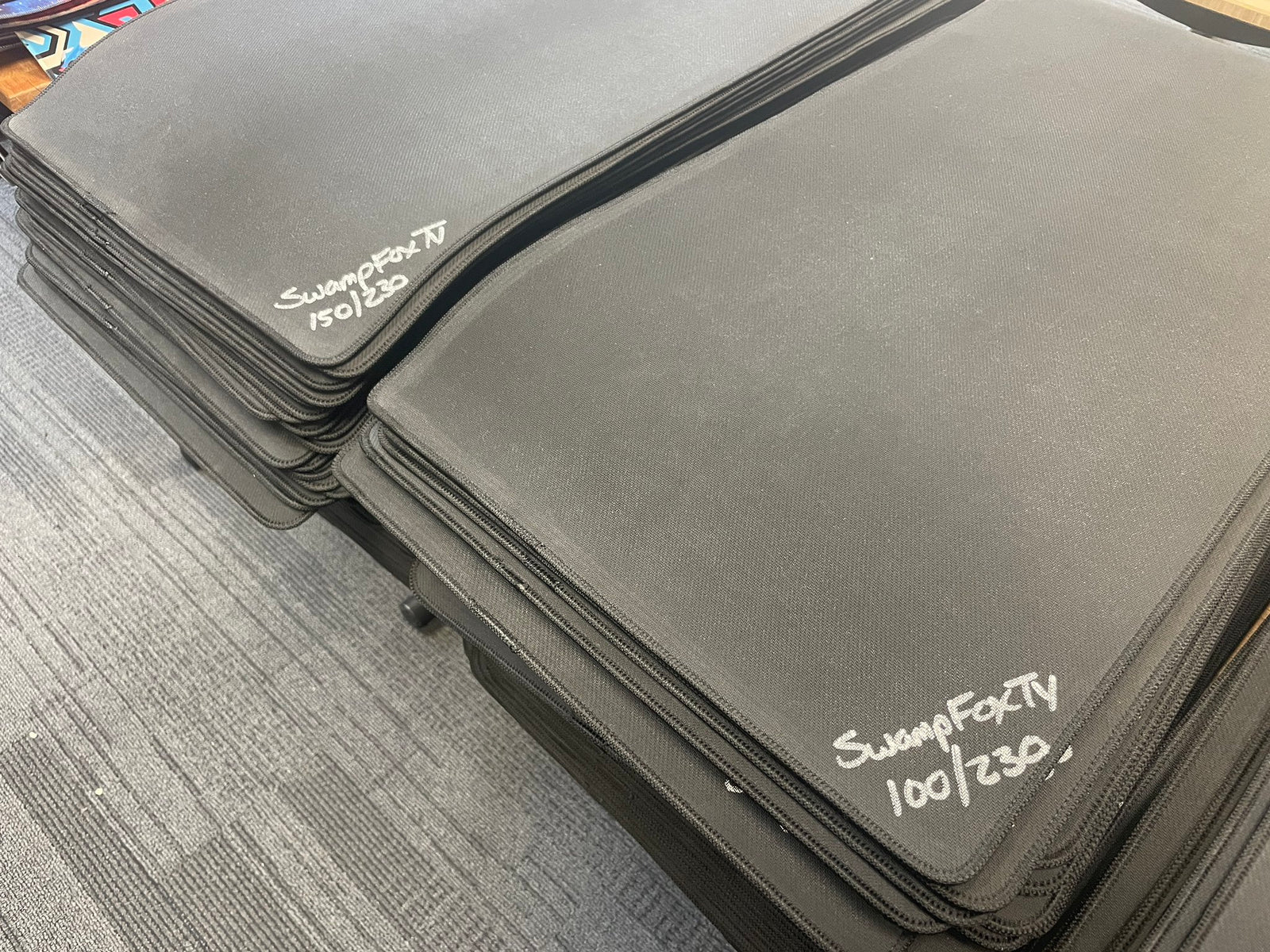 Timeline · 2021 — a stack of numbered mats, "SwampFoxTV 100/230" written on the edge