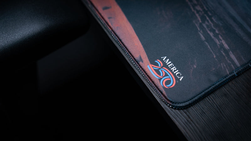america-250-logo-stitched-edge-deskmat-detail