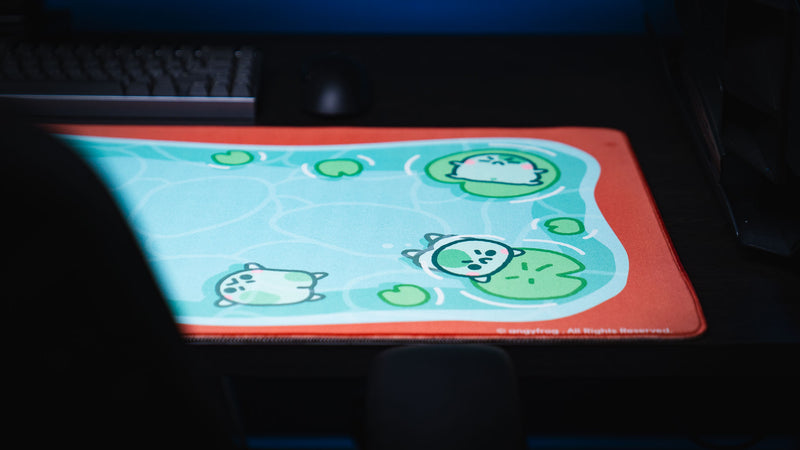 Right-side view of Angyfrog The Pond desk mat showing frogs floating among green lily pads