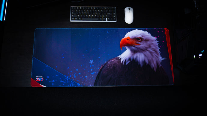 Gaming mouse moving across the dense woven surface of a deskmat