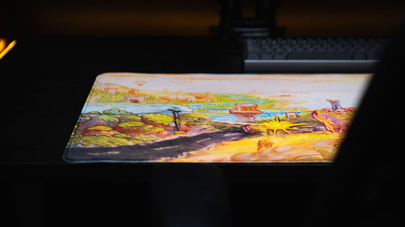 Low-angle view of the Rust After Glory desk mat showing its slim profile and stitched edge