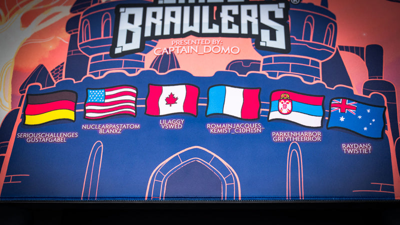 Close-up of the player flags and castle artwork featured on the Bingo Brawlers Season 6 Commemorative Deskmat.