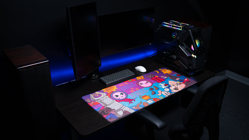 Full gaming setup featuring the Bingus Bongus deskmat paired with a mechanical keyboard, gaming mouse, and RGB desktop PC.