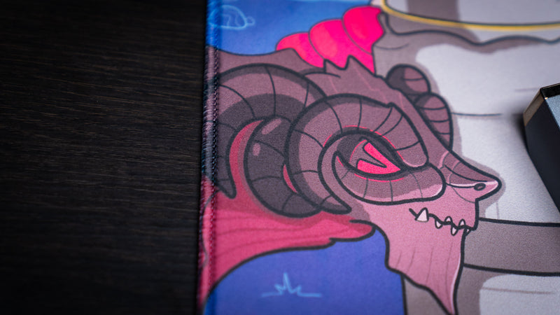 Close-up of the ram skull illustration on the Bingus Bongus deskmat highlighting detailed artwork and rich color reproduction.