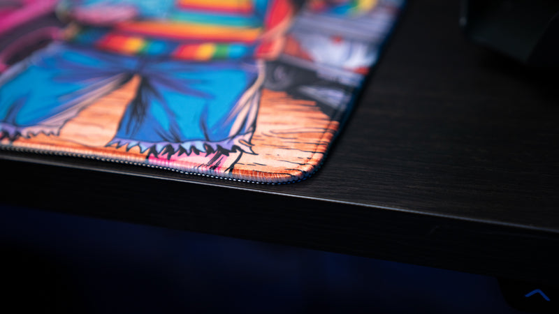 Close-up of the stitched edge on the BobbyRayGray BRG Loading deskmat, highlighting the premium fabric surface and reinforced corner stitching.