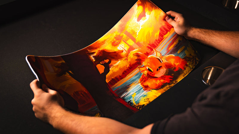Bubbles Playmat by Exodo Studios flexed by hand to show its soft, bendable construction