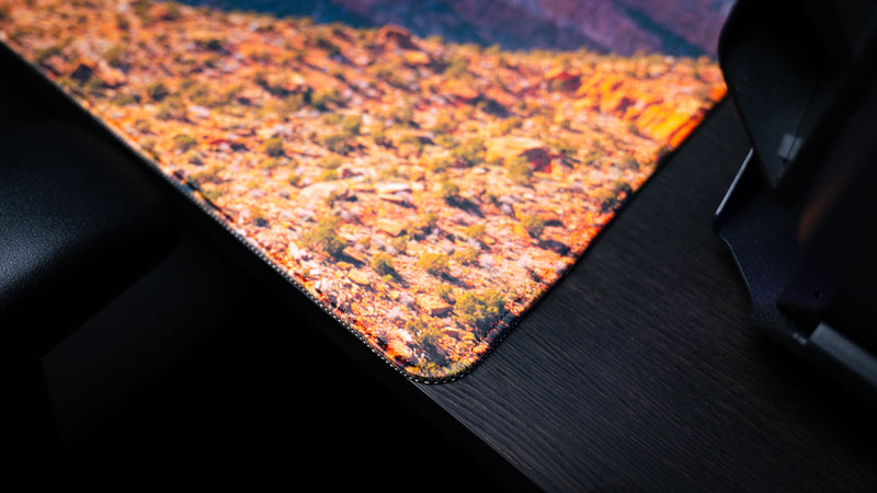 Close-up of the Canyon Junction deskmat highlighting premium stitched edges, detailed Zion National Park photography, durable construction, and a smooth gaming surface.