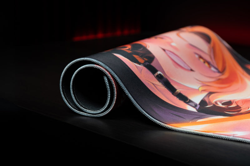 Rolled CelisEris Firewolf gaming deskmat showing the flexible surface and stitched edge