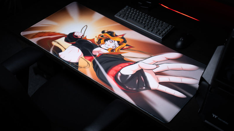 Angled view of the CelisEris Martial anime gaming deskmat beside a keyboard