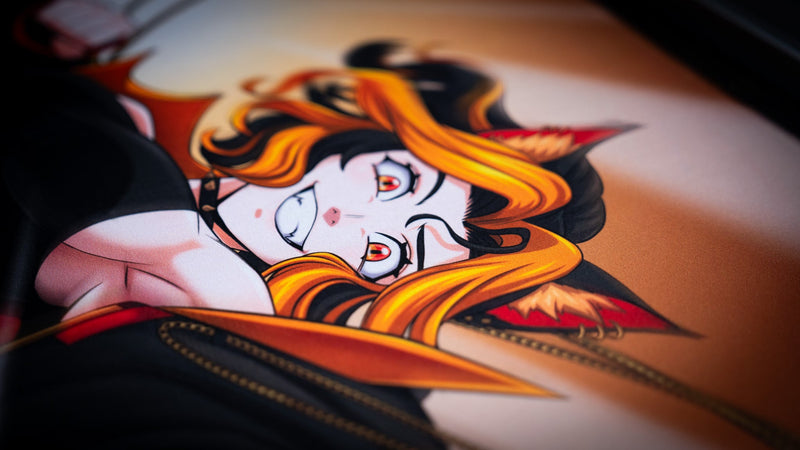 Close-up of the orange-haired character artwork on the CelisEris Martial deskmat