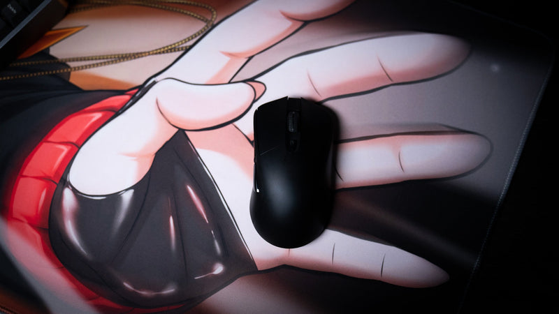 Mouse on the smooth tracking surface of the CelisEris Martial gaming deskmat