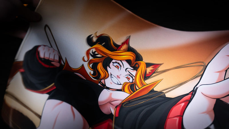Close-up of the orange-haired wolf character artwork on the CelisEris Martial playmat