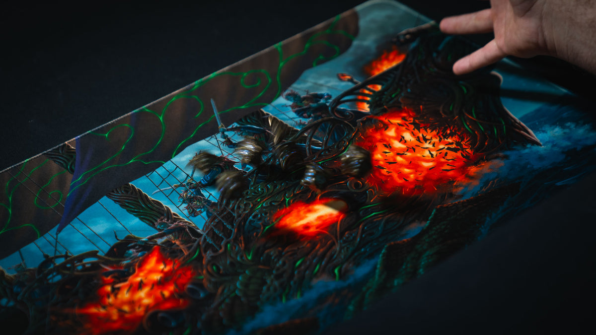 Dice rolling across the Coralborn fantasy TCG playmat, showcasing the detailed naval battle artwork, vivid colors, stitched edges, and durable premium surface built for tabletop gaming.