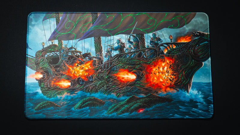 Full view of the Coralborn TCG playmat featuring a living coral warship battling across stormy seas, with vibrant cannon fire, sea creatures, and intricate fantasy artwork.