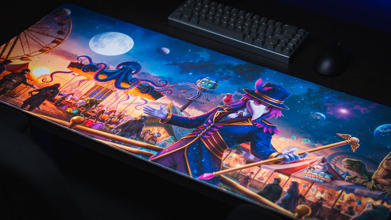 Full artwork view of the Crowmedia Festival of Feathers deskmat beneath a keyboard and mouse