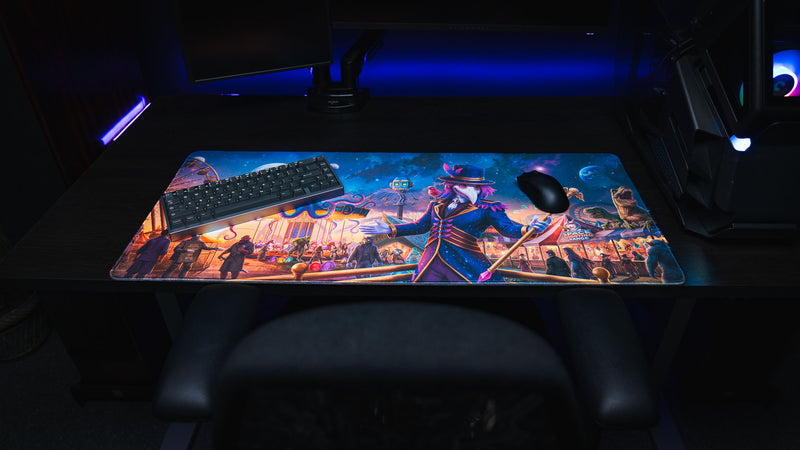 Dark RGB gaming setup featuring the Crowmedia Festival of Feathers deskmat beneath a keyboard and mouse