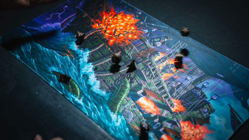Action shot of dice rolling across the Dreadmarrow TCG playmat, highlighting the vibrant ghost ship artwork, smooth premium surface, and expansive play space for tabletop gaming.
