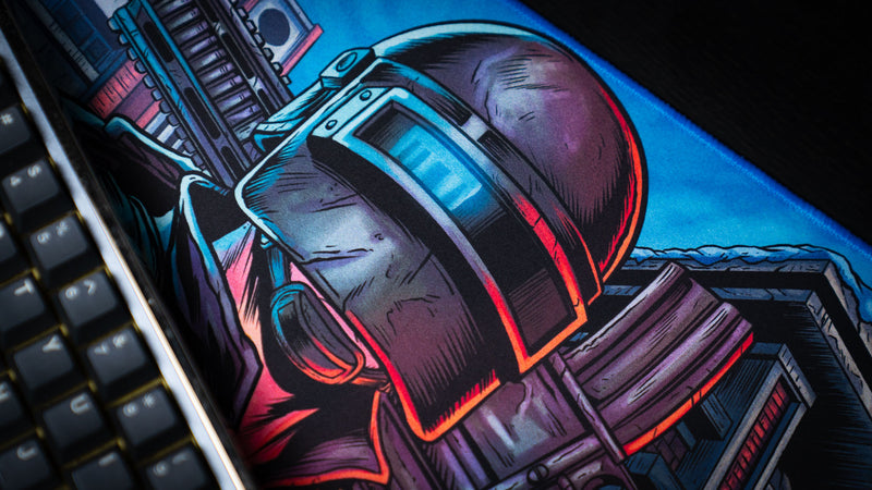 Close-up of the Extraction Boss deskmat by ImOw featuring the central soldier helmet artwork with vibrant comic-style details and a premium stitched-edge finish.