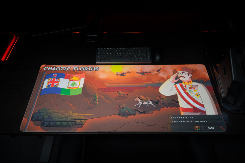 Top view of Florius's Chaotic Dawn gaming deskmat displaying the complete map artwork beneath a keyboard.