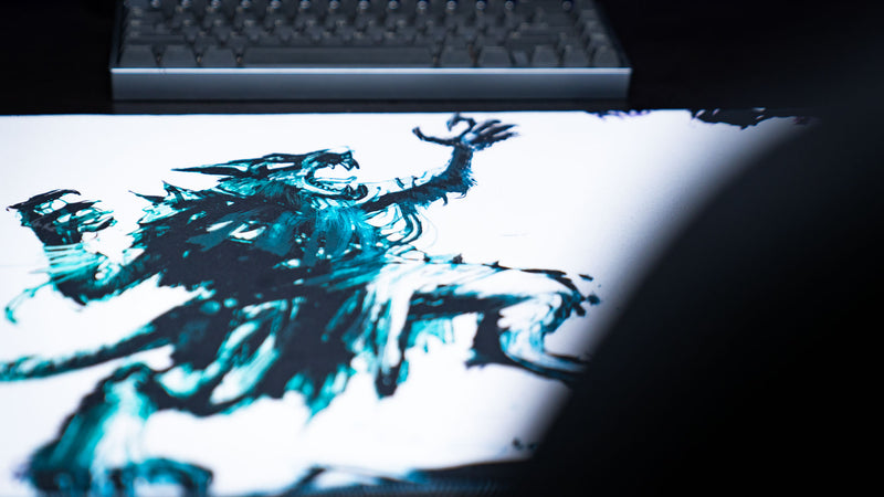 Close-up of the Forbidden Spoils premium gaming deskmat featuring the expressive fantasy rat warrior artwork with dynamic painterly brush strokes.