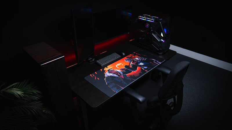 Wide overhead desk setup featuring the Redemption on the Old Road gaming desk mat