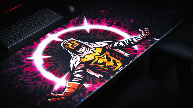 Angled full view of the Grim Kleeper Spare Them desk mat and its glowing crusader artwork