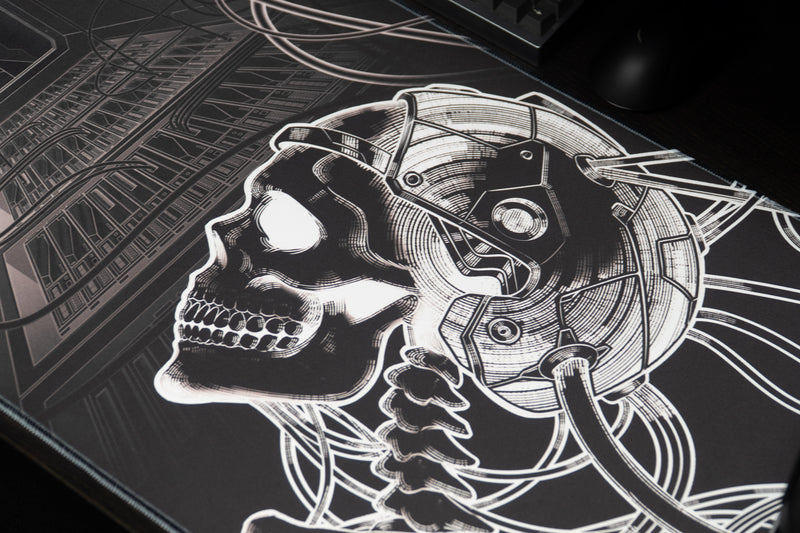 Close-up of the cybernetic skull illustration on GRRT Another Nerf gaming deskmat