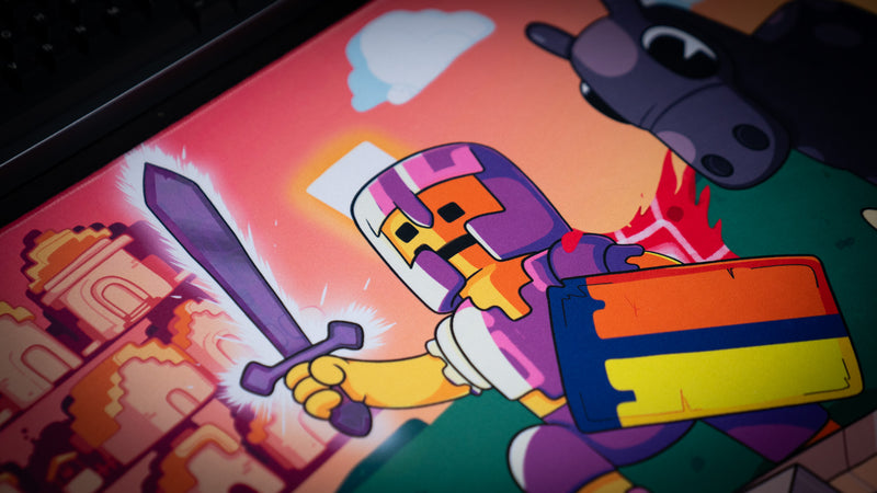 Close-up of the sword-wielding hero and castle on ItzOutlaw's Glorious Victory desk mat