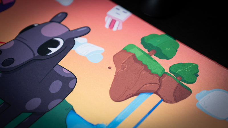 Close-up of the horse and floating island artwork on ItzOutlaw's Glorious Victory desk mat