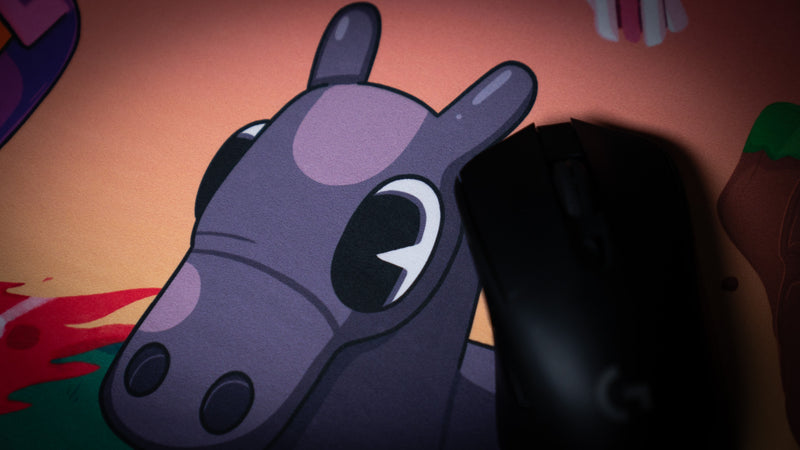 Gaming mouse on the horse artwork of ItzOutlaw's Glorious Victory desk mat
