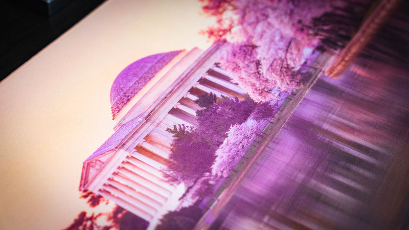 Jefferson Memorial America 250 deskmat featuring the Jefferson Memorial with pink cherry blossoms and reflective water.