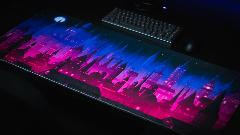 Chroma Kingdom deskmat with keyboard viewed from an elevated angle