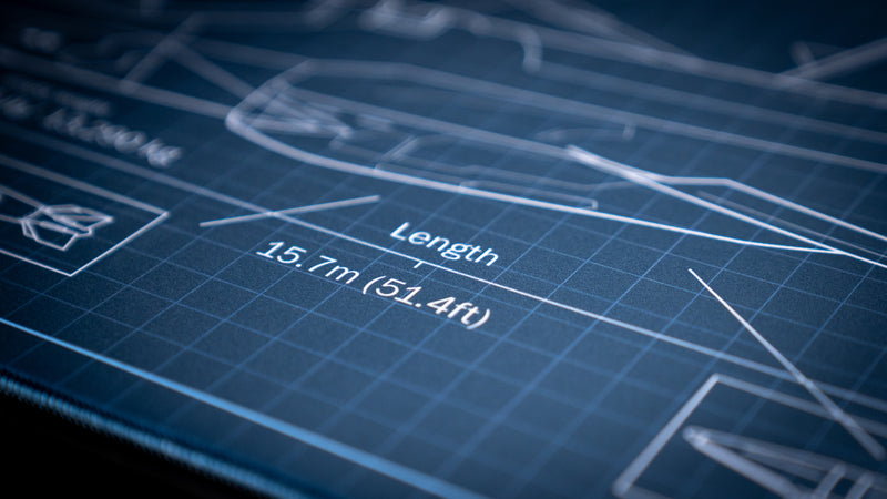 Close-up of the Jimarkus F35 Schematic deskmat highlighting the F-35 Lightning II blueprint with aircraft length measurement and technical schematic details.