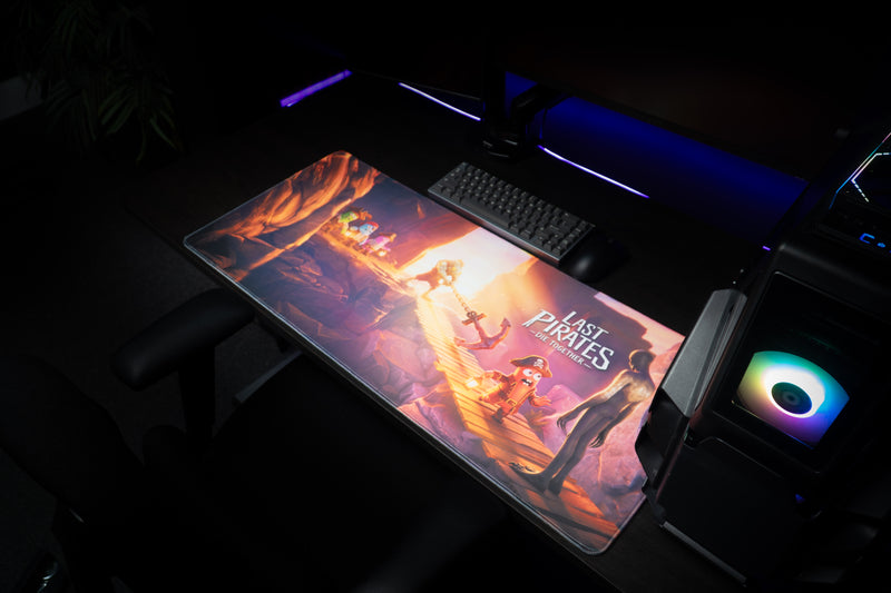 Bridge Escape desk mat on a dark gaming setup with a keyboard and RGB-lit PC