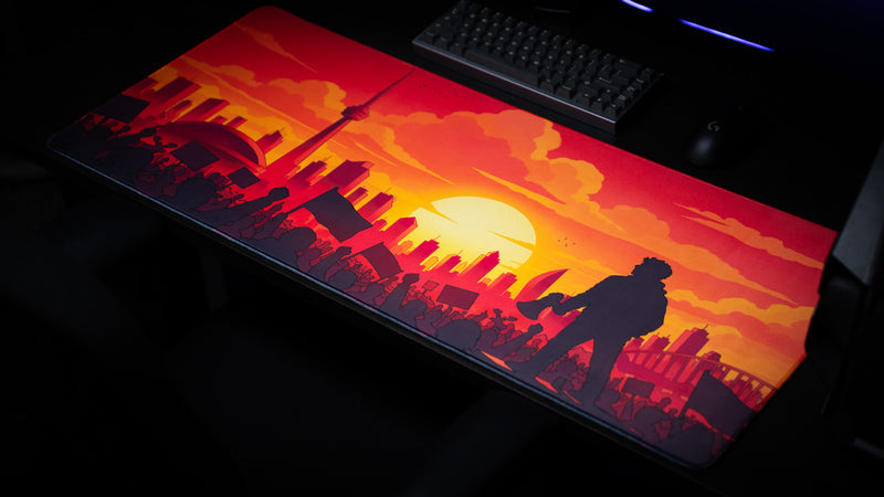 Wide angled view of the MapleTakes Golden Hour Defiance XXL deskmat featuring the CN Tower and sunset artwork