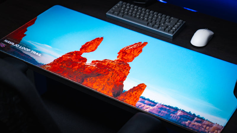 Navajo Loop Trail deskmat featuring Bryce Canyon's iconic Thor's Hammer hoodoo in a panoramic gaming setup with vivid HD photography and premium stitched edges.