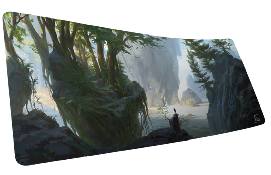 Nick Ragetli Lake of Laugg gaming deskmat mockup showing a misty lake, forested cliffs, and lone traveler