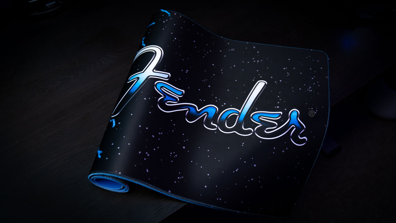 Fender Electric Spellcaster desk mat with centered branding and fantasy rock artwork