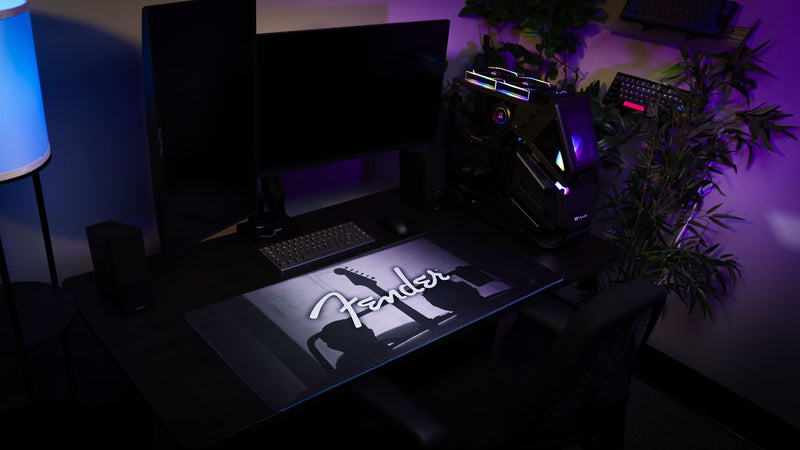 Full-width Fender Family Night Out 1954 desk mat with minimalist black-and-white composition